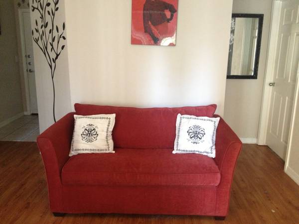 Red Fold-Out Couch
