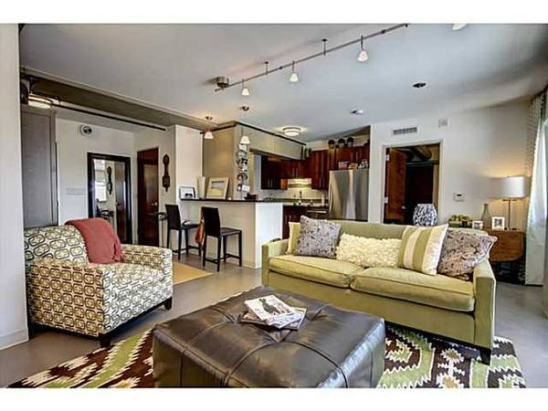 09-Apple Green Sofa, Chair, and Ikat Rug